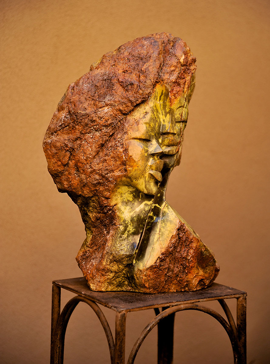 Total Commitment - Leopard Rock African Head Sculpture